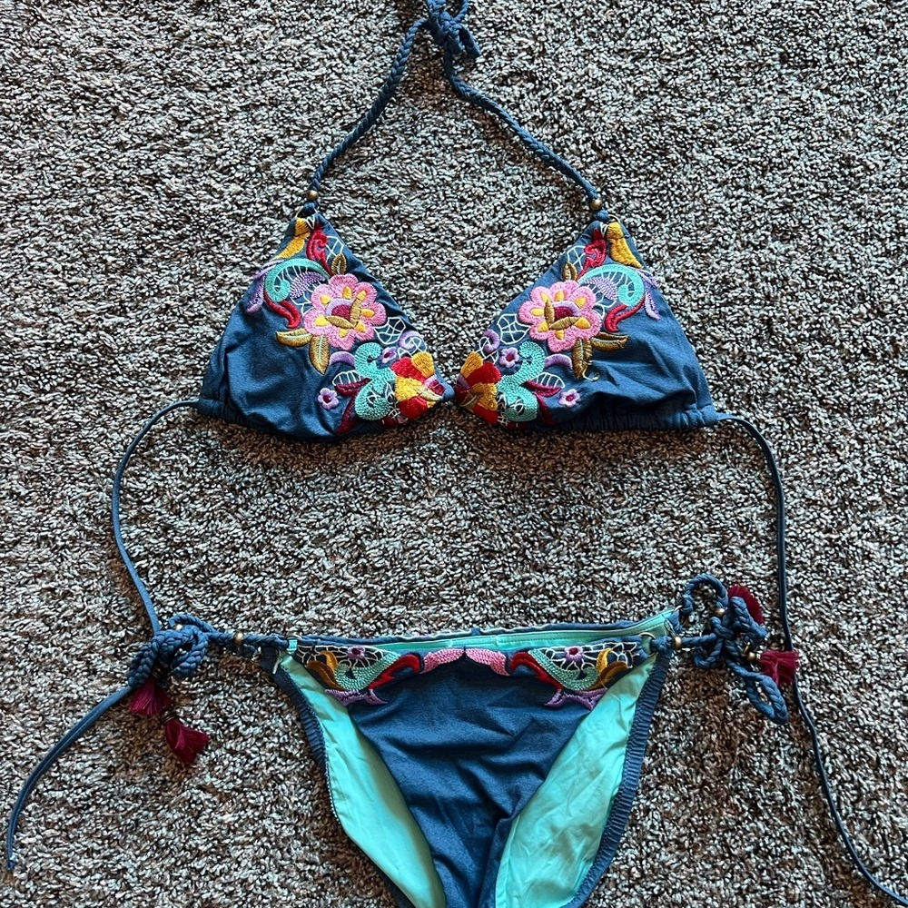 Nanette Lepore blue bikini with rainbow detail and purple tassels